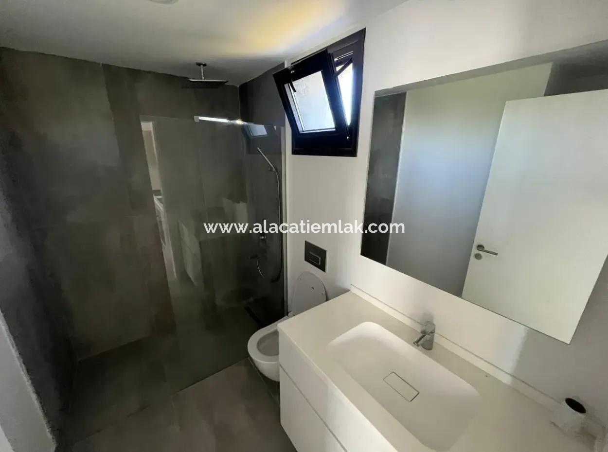 Wohnung Mit Infinity-Pool Zum Verkauf In Cesme Ayasaranda 2 1 Garten