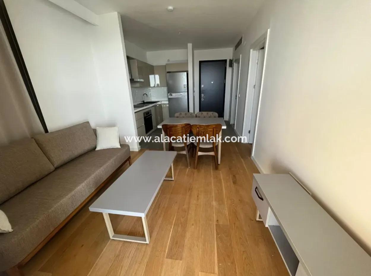 Apartment With Infinity Pool For Sale In Cesme Ayasaranda 2 1 Garden