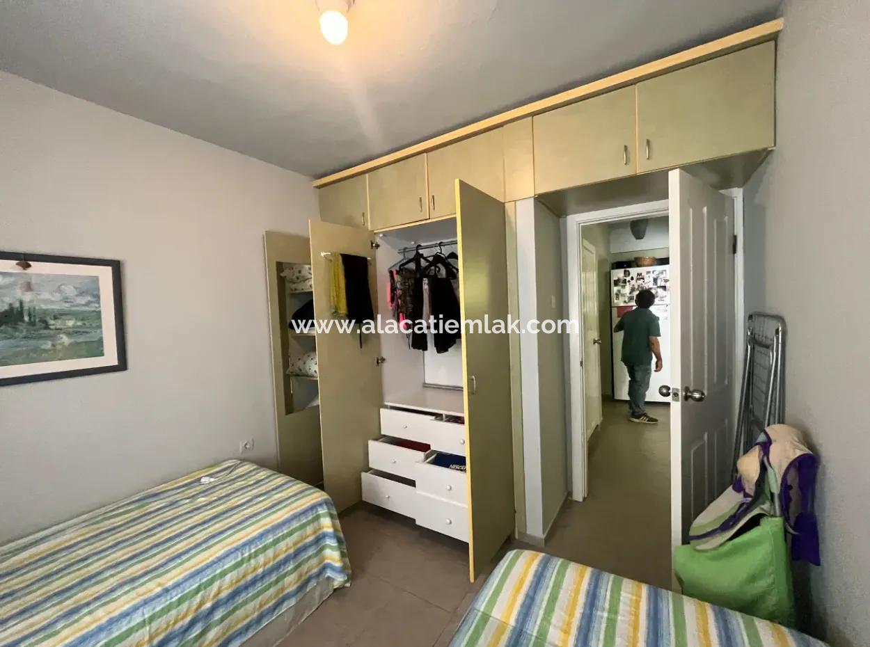 Çeşme Boyalık'ta Denize Sıfır Sezonluk Kiralık Zemin Kat Daire